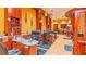 Charming salon with multiple manicure stations, hardwood floors, and warm yellow walls at 2218 Mayfield Palms Ln # 323, Sun City Center, FL 33573