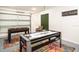 Spacious game room with foosball and air hockey tables, providing fun entertainment options at 2405 Indigo Dr, Clearwater, FL 33763