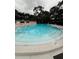 Community swimming pool with multi level shallow end steps at 2405 Indigo Dr, Clearwater, FL 33763