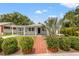 Charming single-story home featuring a brick walkway and a covered carport at 2835 Valencia S Way, St Petersburg, FL 33705