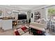 Cozy living area features stylish furnishings, a mounted TV, and contemporary decor for comfortable living at 2835 Valencia S Way, St Petersburg, FL 33705