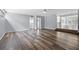 Open-concept living room with hardwood floors throughout at 2835 Valencia S Way, St Petersburg, FL 33705