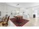 Open-concept dining room looking into the kitchen at 30393 Palmer Oak Dr, Wesley Chapel, FL 33543