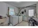 Practical laundry room with washer, dryer, utility sink and necessary hookups in view at 4308 5Th W Ave, Palmetto, FL 34221