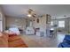 Cozy living room featuring tile floors, neutral walls, and comfortable seating arrangements at 4308 5Th W Ave, Palmetto, FL 34221