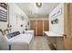 Laundry room with side by side washer and dryer, folding table, and ample lighting at 4775 Cove Cir # 205, St Petersburg, FL 33708