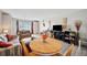 Cozy living room featuring neutral walls, hardwood floors, and comfortable seating at 4775 Cove Cir # 205, St Petersburg, FL 33708