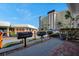 Outdoor grilling area with built-in grills and a building view at 4775 Cove Cir # 205, St Petersburg, FL 33708
