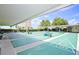 Covered shuffleboard courts provide a fun community activity with ample seating and space at 4775 Cove Cir # 205, St Petersburg, FL 33708