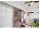 Bright sunroom with interior access offers scenic views and comfortable seating at 4775 Cove Cir # 205, St Petersburg, FL 33708