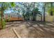 Exterior of house with a large back yard and a wood deck at 5502 N 9Th St, Tampa, FL 33604