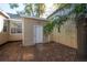 Cozy back yard area featuring a storage shed at 5502 N 9Th St, Tampa, FL 33604