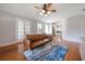 Bright living room with hardwood floors, and access to the kitchen area at 5502 N 9Th St, Tampa, FL 33604