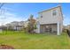 A backyard view showcasing a screened-in porch and a charming pergola at 6219 Voyagers Pl, Apollo Beach, FL 33572