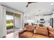 Open concept living room seamlessly integrates indoor and outdoor spaces at 6219 Voyagers Pl, Apollo Beach, FL 33572