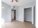 Bedroom with tiled floors and a closet at 6414 Hollydale Pl # 101, Riverview, FL 33578