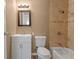 Bathroom with shower-tub combination, updated vanity, and great lighting at 7507 Betula Dr, New Port Richey, FL 34653