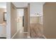 Hallway view leading to living room with wood flooring and natural lighting at 7507 Betula Dr, New Port Richey, FL 34653