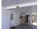 Carport area with storage and access to the laundry facilities at 7729 39Th N Ter, St Petersburg, FL 33709
