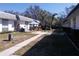Charming courtyard area with outdoor seating and well-maintained landscaping at 7729 39Th N Ter, St Petersburg, FL 33709
