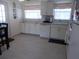 Bright kitchen with white cabinets, countertops, stainless steel appliances and plenty of storage at 7729 39Th N Ter, St Petersburg, FL 33709