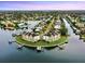 Waterfront townhomes offer modern design and boat docks for coastal living at 774 Gran Kaymen Way, Apollo Beach, FL 33572