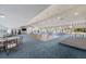 Expansive ballroom featuring dance floor, tables, and pool access at 7892 Sailboat Key S Blvd # 307, South Pasadena, FL 33707