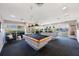 Spacious billiard room offering pool tables with beautiful outside view at 7892 Sailboat Key S Blvd # 307, South Pasadena, FL 33707