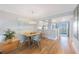 Cozy dining room with an oval table and seating for four, adjacent to a bright kitchen and outdoor access at 7892 Sailboat Key S Blvd # 307, South Pasadena, FL 33707