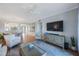 Open living space with a living room that flows into the dining area, featuring ample seating and natural light at 7892 Sailboat Key S Blvd # 307, South Pasadena, FL 33707