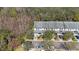 Aerial view of the townhouse showing the roofline and landscaping at 8004 Downpatrick Ct, Tampa, FL 33610