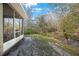 The backyard is a serene sanctuary with a view of the wooded area at 8004 Downpatrick Ct, Tampa, FL 33610