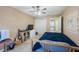 Bedroom featuring carpeted floors, ceiling fan, and a closet at 8004 Downpatrick Ct, Tampa, FL 33610