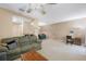 Open-concept living and dining area with neutral paint and lots of natural light at 8004 Downpatrick Ct, Tampa, FL 33610