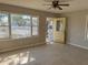 Inviting living room featuring tile floors, ample natural light, and convenient access to the front door at 808 20Th W Ave, Bradenton, FL 34205