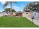 Charming single Gathering home with well maintained lawn, mature landscaping, and inviting curb appeal at 9040 Lunar Ln, Port Richey, FL 34668