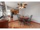 Comfortable dining area featuring an ornate ceiling fan, seating for four, and wood accents at 1053 56Th N Ave, St Petersburg, FL 33703