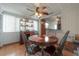 Dining area is well-lit with a ceiling fan and showcases a glimpse of the kitchen at 1053 56Th N Ave, St Petersburg, FL 33703