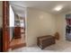 Bright entryway with tiled flooring, a wooden chest and a view to the living room at 1053 56Th N Ave, St Petersburg, FL 33703