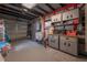 Organized garage with storage cabinets, shelving units, and ample space for parking at 1053 56Th N Ave, St Petersburg, FL 33703