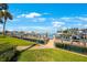 Daytime view of well-maintained dock with boat parking at 1060 Pinellas Bayway S # 103, St Petersburg, FL 33715