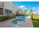 Enjoy the sunshine by the pool and hot tub at this complex at 1060 Pinellas Bayway S # 103, St Petersburg, FL 33715