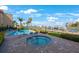 Community swimming pool and jacuzzi, as well as waterfront boat docks at 1060 Pinellas Bayway S # 103, St Petersburg, FL 33715