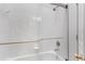 Modern walk-in shower features white tiles, glass door, and chrome shower fixtures at 112 Brent Cir, Oldsmar, FL 34677