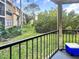 View from the balcony, looking out onto the grassy courtyard and landscaping at 11901 4Th N St # 10102, St Petersburg, FL 33716