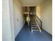 Hallway with staircase leading to the next floor at 11901 4Th N St # 10102, St Petersburg, FL 33716