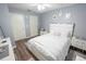 Bedroom featuring a bed, closet, and minimalist decor at 11901 4Th N St # 10102, St Petersburg, FL 33716