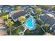 Aerial view of a beautiful community pool with lounge chairs and well-maintained landscaping at 11901 4Th N St # 10102, St Petersburg, FL 33716