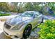 Silver Infiniti G37S parked along the side of a tree-lined street at 12607 San Blas Loop, Largo, FL 33774