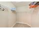 Walk-in closet with wire shelving at 12607 San Blas Loop, Largo, FL 33774